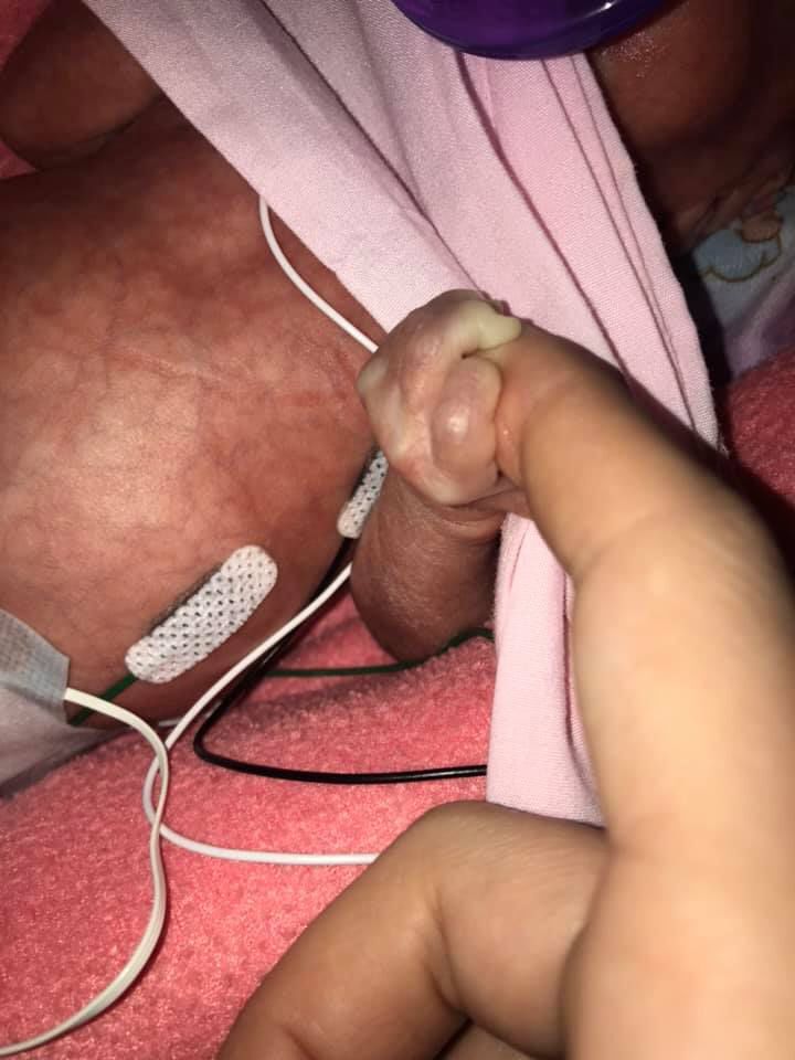 Keeleyjan9gripping momshand.jpg